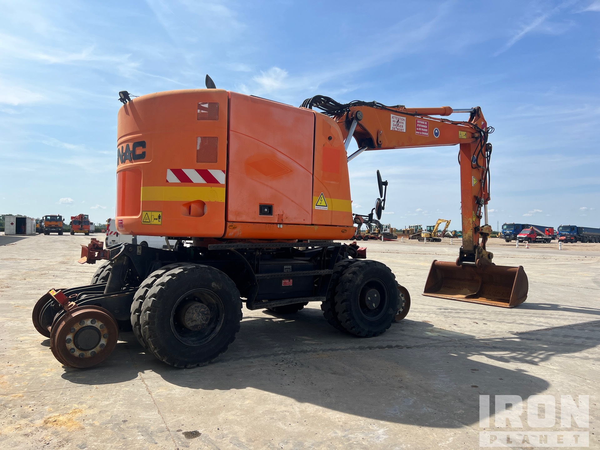 2010 UNAC 22TRR Rail Equipped Wheel Excavator (Cat M315D) in
