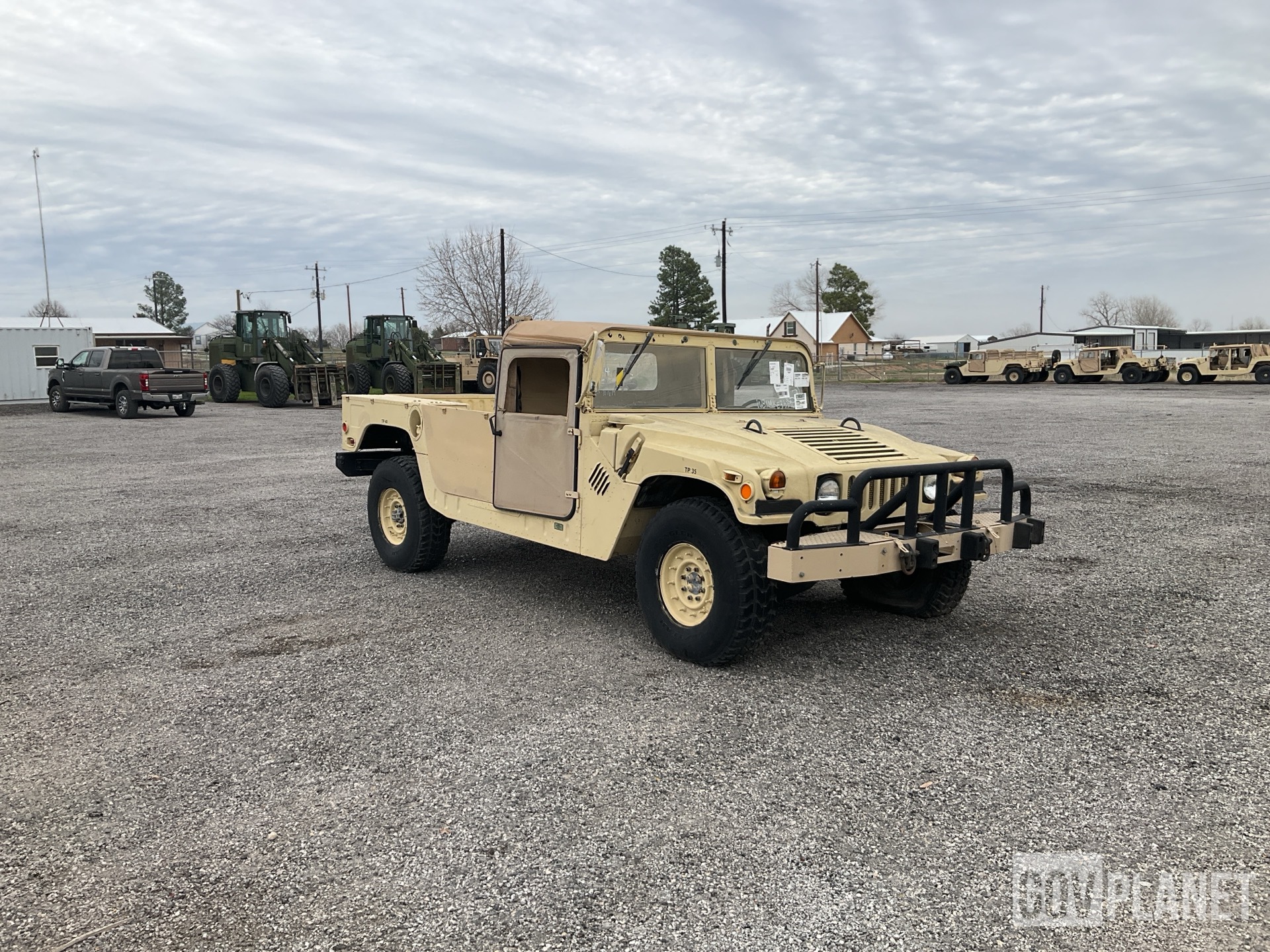 Surplus AM General M1097R1 HMMWV 2 Door Soft Top w/Truck Body in 