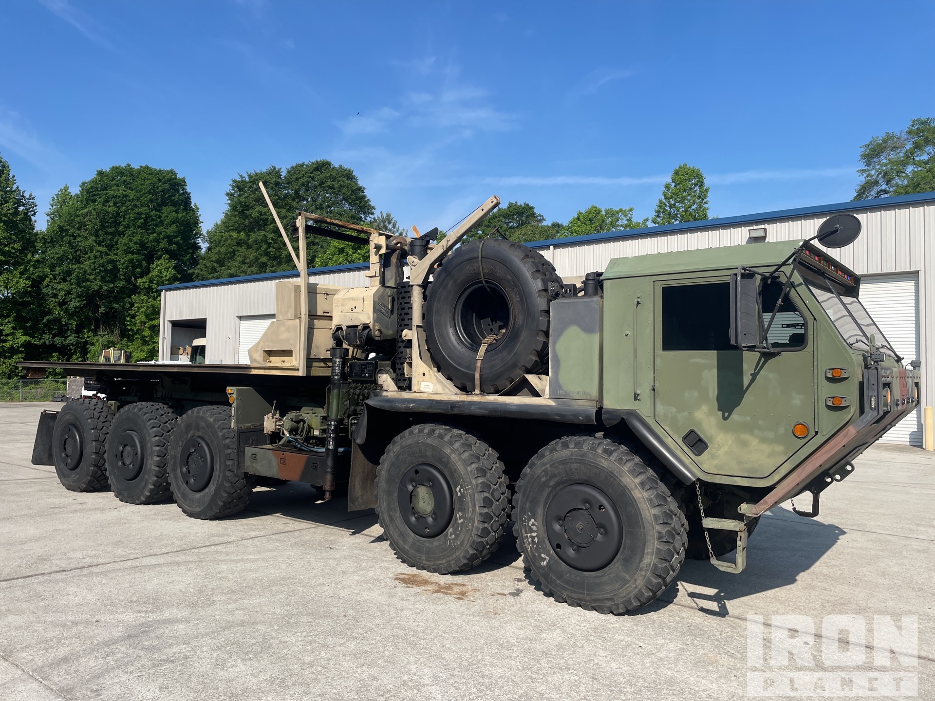 1996 Oshkosh M1074 10x10 Roll-Off Truck in Gainesville, Georgia