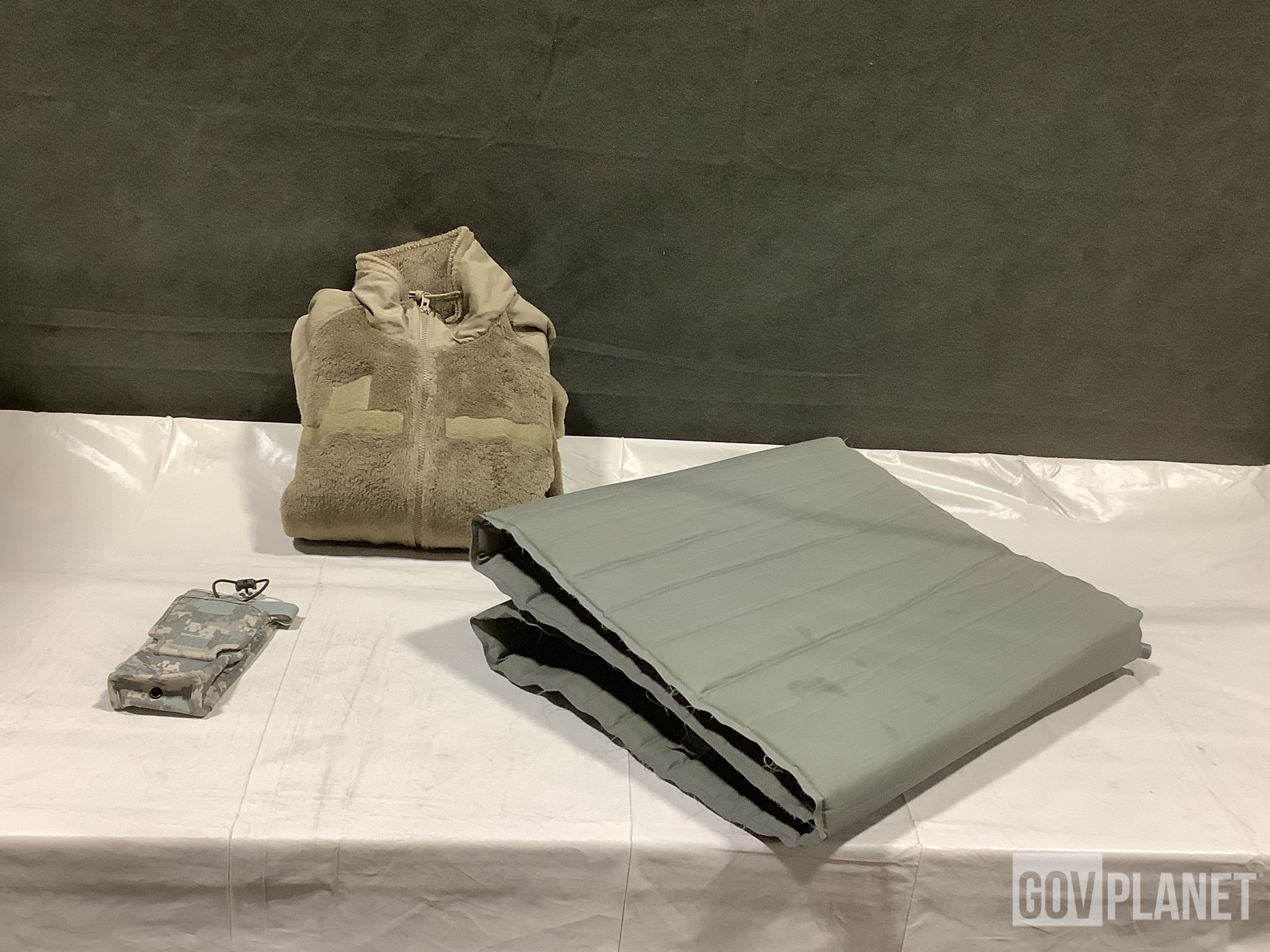 Surplus (21) Holsters, (15) Sleeping Mats, (17) Cold Weather 