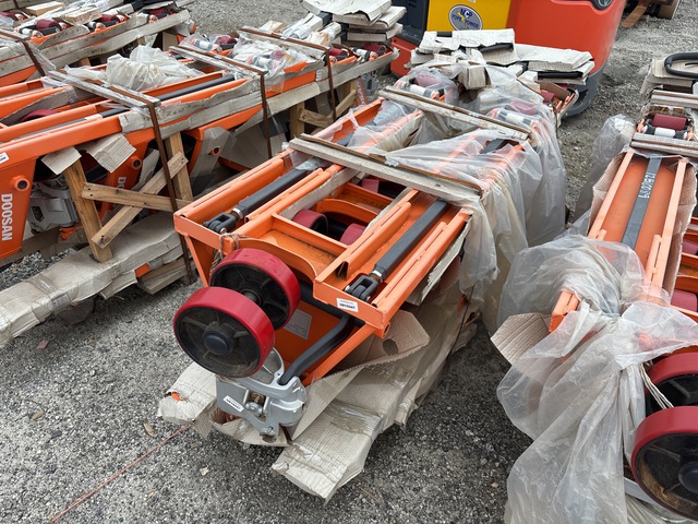 Quantity of (6) Doosan AC25 5500 lb Pallet Jack (Unused)