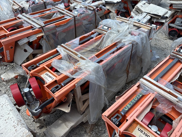 Quantity of (6) Doosan AC25 5500 lb Pallet Jack (Unused)