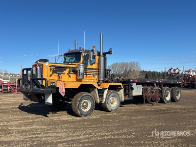 2002 Kenworth C500B 8x4 Twin-Steer Bed Truck