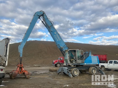 2012 Fuchs MHL340 Manipuladora de material con ruedas