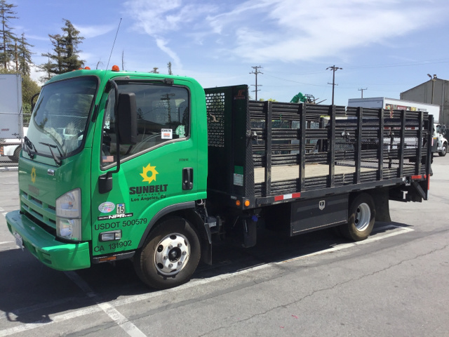 2012 Isuzu NPR S/A Flatbed Truck