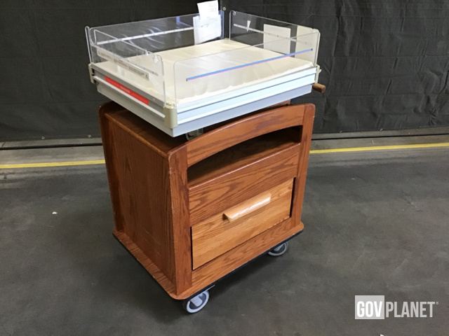 wooden hospital bassinet