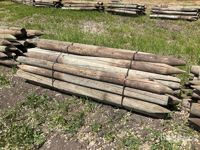 Quantity of (25) 7 ft x 4 in Treated Fence Post | Ritchie Bros. Auctioneers
