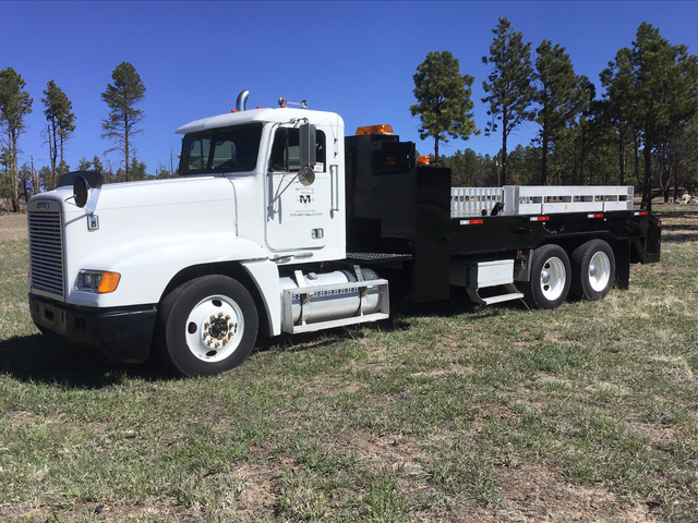 1999 Freightliner FLD120 T/A Flatbed Water Truck 1999 Freightliner FLD120 T/A Flatbed Water Truck