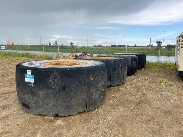 Quantity of (4) 45/65-45 Tires w/Wheels - Fits Cat 992C