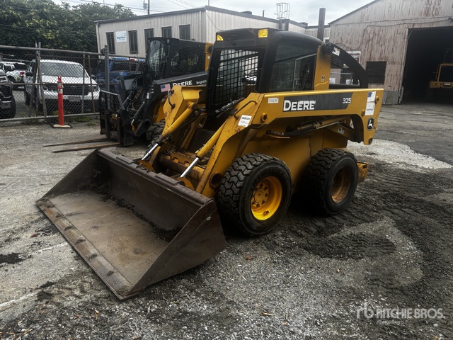MINI CARGADOR SOBRE RUEDAS 2007 JOHN DEERE 325