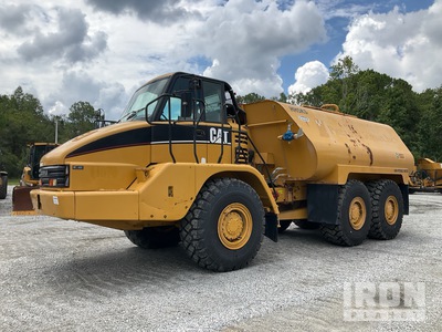 2006 Cat 725 5000 gal 6x6 Camion de agua articulado