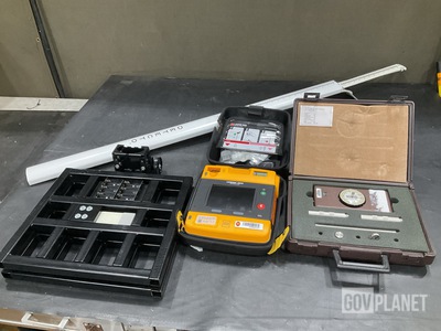 (1) Push Pull Gauge, (13) Defibrillators, (3) Scales & Assorted Items