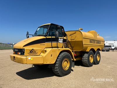 2004 Cat 730 6x6 Camion-citerne à eau articulé