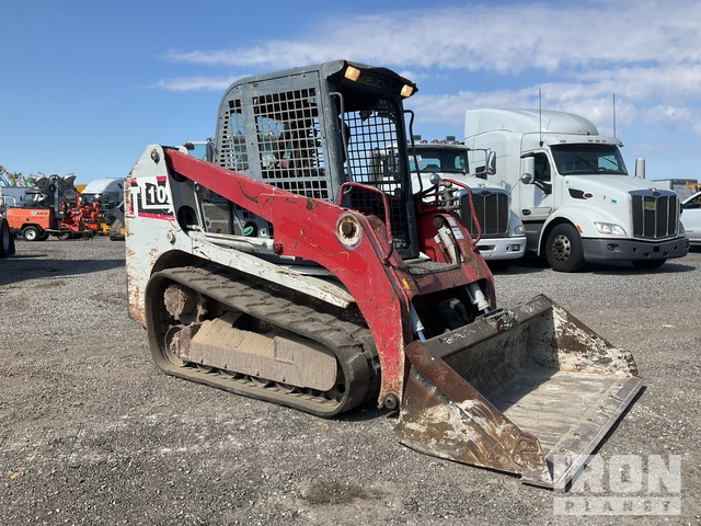 MINI CARGADOR SOBRE ORUGAS 2016 TAKEUCHI TL10