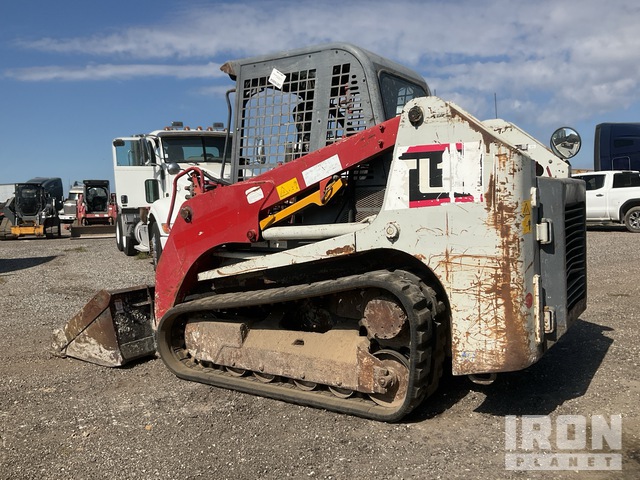 MINI CARGADOR SOBRE ORUGAS 2016 TAKEUCHI TL10