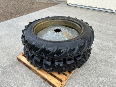 Quantity of (2) Advantage 11.2-38 Pivot Rims & Tires