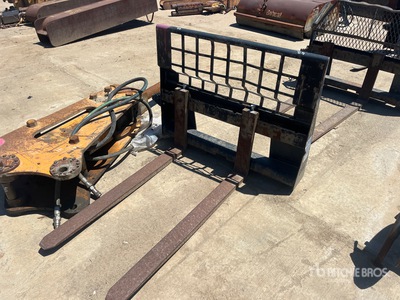 Cat 48 in Skid Steer Forks