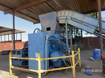 Olympic TR-1052-100HP Skid-Mounted 150 Ton Enfardadora