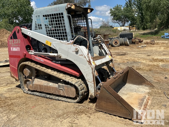 MINI CARGADOR SOBRE ORUGAS 2014 TAKEUCHI TL230SERIES2