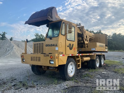 1990 Gradall G660E Pelle à roues pour travaux routiers