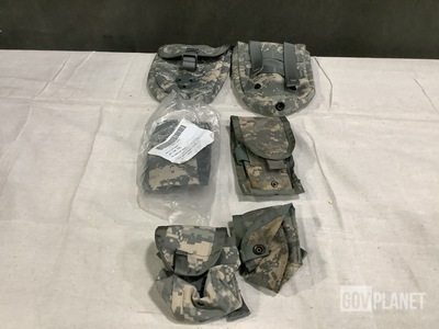 (63) Entrenching Tool Carriers, (143) M4 Two Mag Pouches & Assorted Items