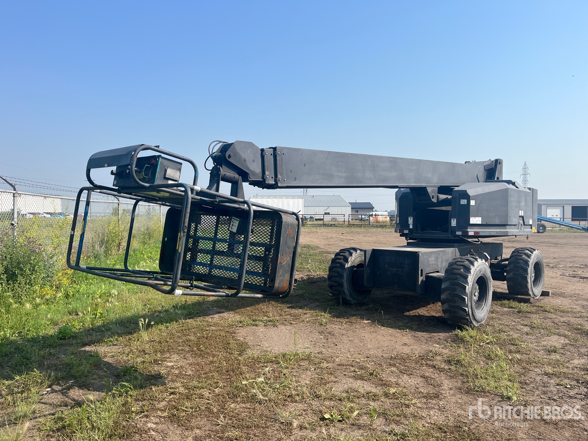 1997 Genie S60 4WD Dual Fuel Telescopic Boom Lift