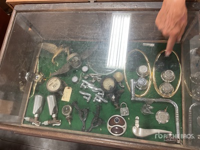 Display w/ Moto Meters, Center Caps & Key Chains Antiques