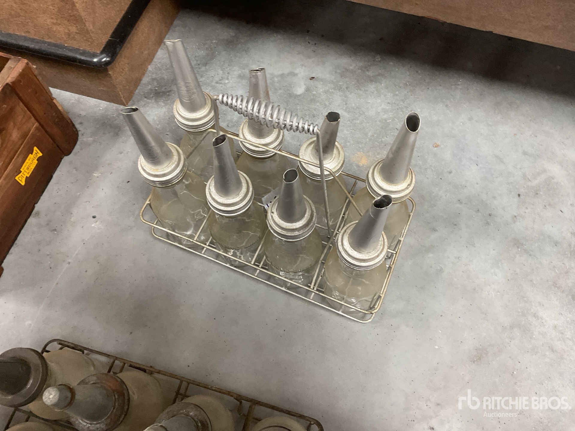 Quantity of (8) Liquid quart bottle w/ spout