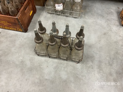 Quantity of (8) Liquid quart bottle w/ spout