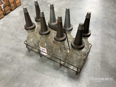 Quantity of (8) Liquid quart bottle w/ spout