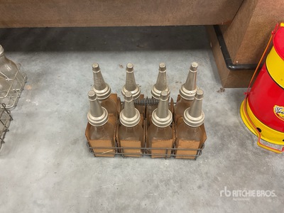 Quantity of (8) Liquid quart bottle w/ spout