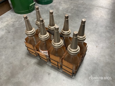 Quantity of (8) Liquid quart bottle w/ spout