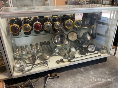 Quantity of (8) Ford 540 Round Lens Lamp and radiator caps Antiques