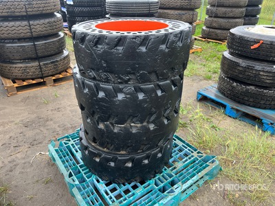 Quantity of (4) 31X6X10/10-16.5 Skid Steer Tires