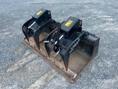 Cat 66 in Skid Steer Grapple Bucket