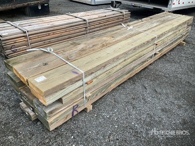 Quantity of (18) 3 in x 12 in x 2 ft' Surplus Pressure Treated Lumber