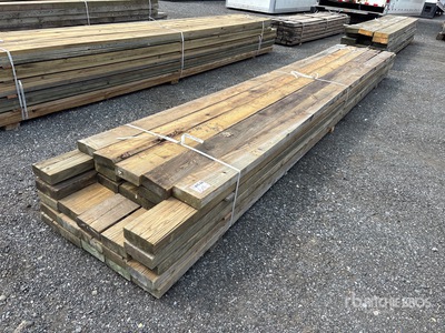 Quantity of (30) 3 in x 8 in x 18 ft - 20 ft Surplus Pressure Treated Lumber