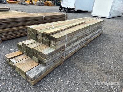 Quantity of (40) 2 in x 8 in x 14 ft - 18 ft Surplus Pressure Treated Lumber