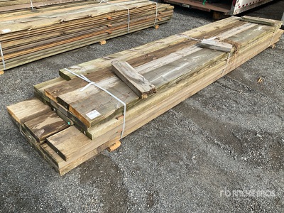 Quantity of (21) 3 in x 8 in - 12 in x 16 ft - 18 ft Surplus Pressure Treated Lumber
