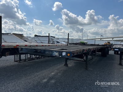 1999 Daco F25NAR4899 80000 lb 48 ft T/A Spread Axle Flatbed Trailer