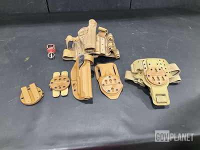 (35) Individual Holsters, (227) Firing Blank Attachments & Assorted Items