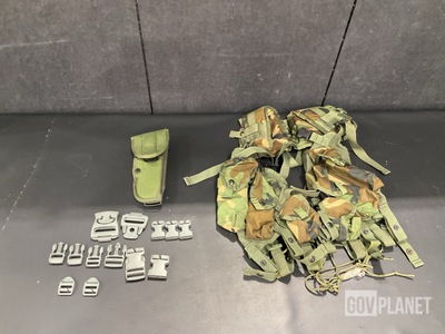 (9) Holsters, (80) MOLLE Buckle Sets, (8) Tactical Vests & Assorted Items