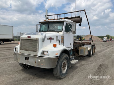 2002 Peterbilt 330 6x4 Roll-Off Truck