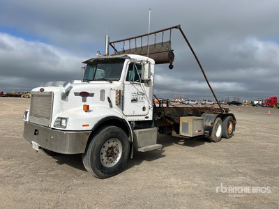 2002 Peterbilt 330 6x4 Roll-Off Truck