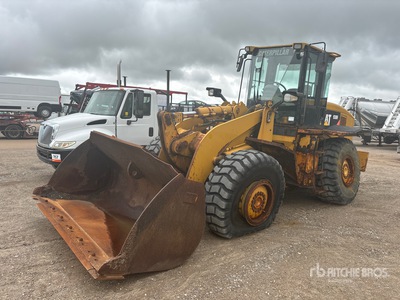 2010 Cat 938H Pala gommata