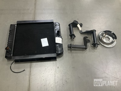 (1) Radiator, (1) Brake Component, (3) Bracket Assemblies & Assorted Items