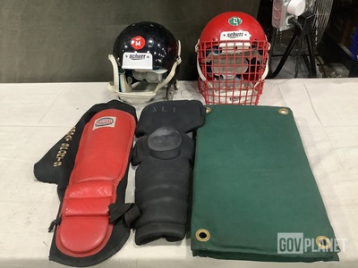 (12) Helmets, (4) Shin Guards, (11) Striking Shield Pads & Assorted Items