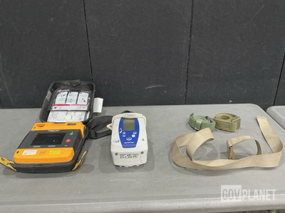 (1) Defibrillator, (1) Patient Monitor & Assorted Items