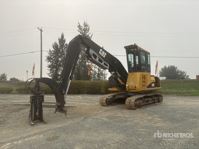 2008 Cat 320D Heel Boom Cargadora de troncos