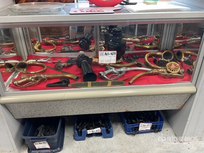 Quantity of antique brass pumps and horns